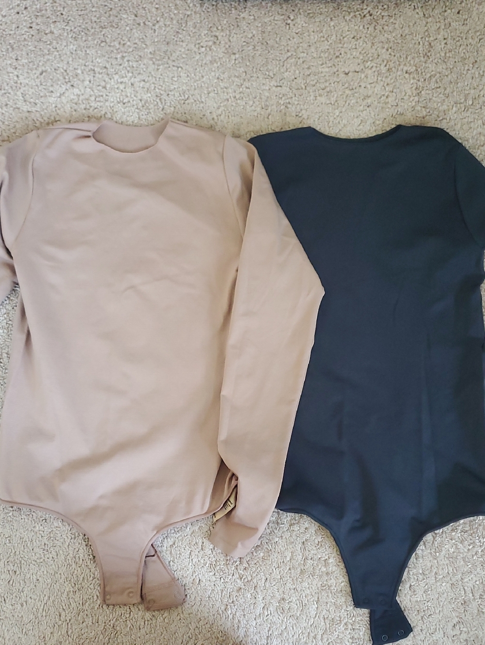SKIMS Long-Sleeve And Short Sleeve One-Piece Bodysuits in Nude and Black